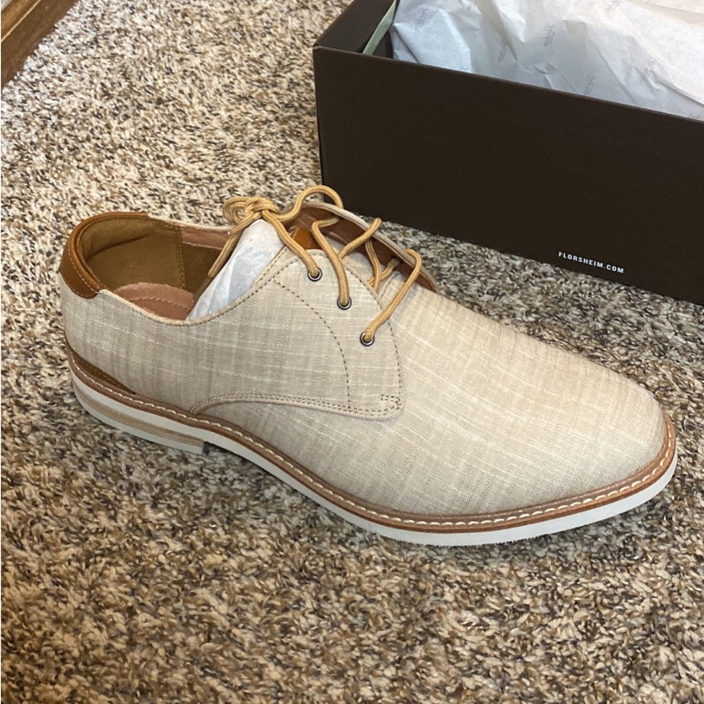 Men’s size 10.5 beige dress shoes. Never worn from Men’s Wearhouse